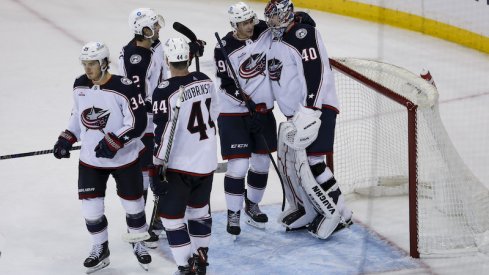 Columbus Blue Jackets' Yegor Chinakhov celebrates with Columbus Blue Jackets' Daniil Tarasov after defeating the New York Rangers at Madison Square Garden.