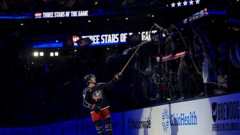 Columbus Blue Jackets' Nick Blankenburg tosses a stick into the crowd after the game the Nashville Predators at Nationwide Arena.