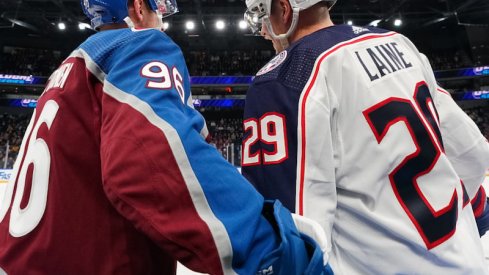 Columbus Blue Jackets' Patrik Laine and Colorado Avalanche's Mikko Rantanen during the 2022 NHL Global Series in Tampere, Finland.