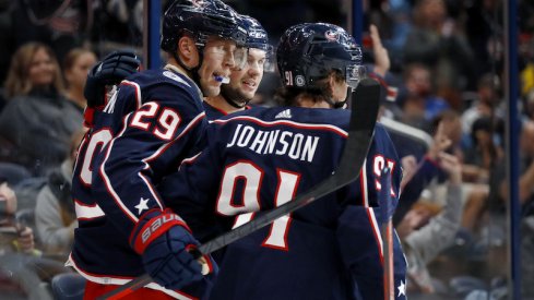 Columbus Blue Jackets' Patrik Laine celebrates his goal with Kent Johnson during the second period against the Pittsburgh Penguins at Nationwide Arena.