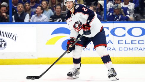 Columbus Blue Jackets' Andrew Peeke skates with the puck against the Tampa Bay Lightning during the third period at Amalie Arena.