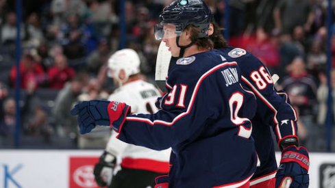 Kent Johnson celebrates after scoring a goal in the Senators vs. Blue Jackets game.