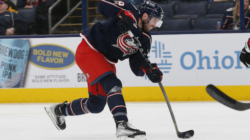 Columbus Blue Jackets center Liam Foudy (19) shoots on goal against the Pittsburgh Penguins during the second period at Nationwide Arena.