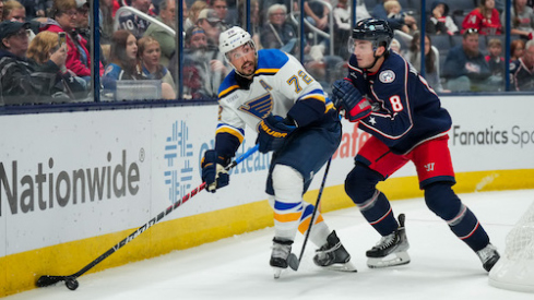 St. Louis Blues defenseman Justin Faulk (72) skates with the puck against Columbus Blue Jackets defenseman Zach Werenski (8) in the second period at Nationwide Arena.