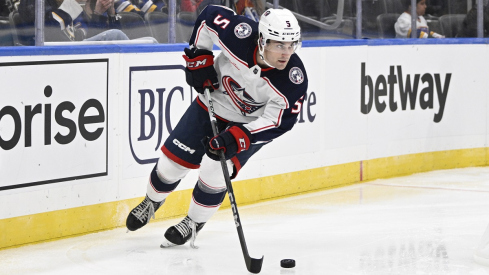 Columbus Blue Jackets defenseman Denton Mateychuk skates against the St. Louis Blues in preseason action