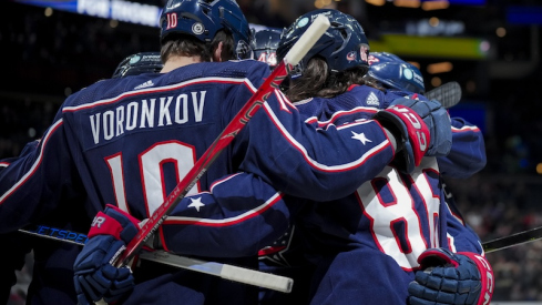 Columbus Blue Jackets' Kirill Marchenko celebrates with teammates after scoring a goal against the Tampa Bay Lightning in the first period at Nationwide Arena.