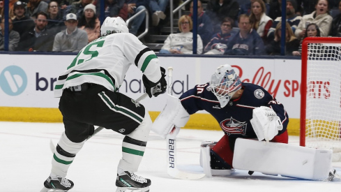 Dallas Stars' Matt Duchene slides the puck under Columbus Blue Jackets' Spencer Martin for a goal during the second period at Nationwide Arena.