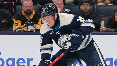 Columbus Blue Jackets right wing Patrik Laine (29) carries the puck away from Pittsburgh Penguins defenseman Kris Letang (58) during the third period at Nationwide Arena.