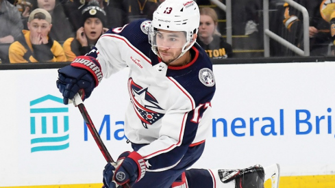 Columbus Blue Jackets left wing Johnny Gaudreau (13) shoots the puck during the second period against the Boston Bruins at TD Garden.