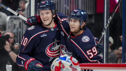 Columbus Blue Jackets' Yegor Chinakhov celebrates with teammate Dmitri Voronkov after scoring a goal against the Montreal Canadiens in the second period at Nationwide Arena.