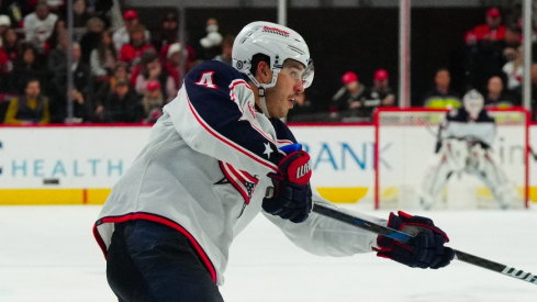 Columbus Blue Jackets center Cole Sillinger (4) watches his shot against the Carolina Hurricanes during the second period at PNC Arena.