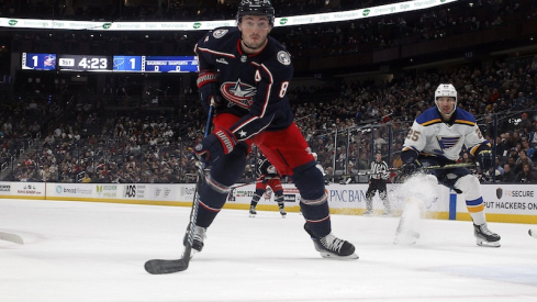 Columbus Blue Jackets' Zach Werenski tracks down a loose puck against the St. Louis Blues during the first period at Nationwide Arena.