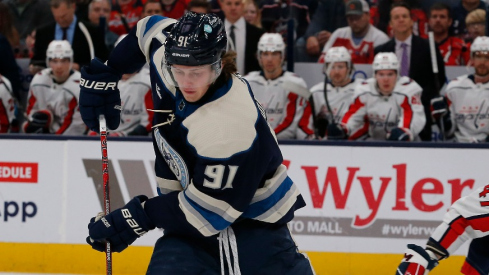 Columbus Blue Jackets left wing Kent Johnson (91) skates away from Washington Capitals left wing Beck Malenstyn (47) during the first period at Nationwide Arena.