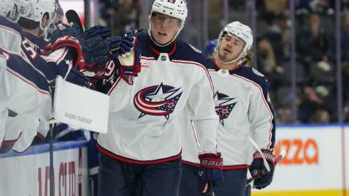 Patrik Laine gets congratulated after scoring against the Toronto Maple Leafs 