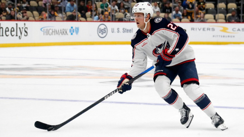 Columbus Blue Jackets defenseman Adam Boqvist (27) skates with the puck against the Pittsburgh Penguins in the shootout at PPG Paints Arena.