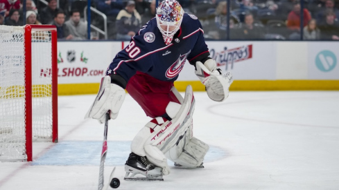 Columbus Blue Jackets' Elvis Merzlikins controls the puck against the Montreal Canadiens in the third period at Nationwide Arena.