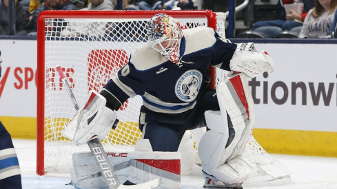 Columbus Blue Jackets' Elvis Merzlikins makes a blocker save against the Pittsburgh Penguins during the second period at Nationwide Arena.