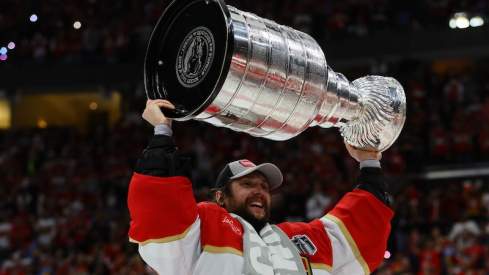 Florida Panthers goaltender Sergei Bobrovsky (72) hoists the Stanley Cup after defeating the Edmonton Oilers in game seven of the 2024 Stanley Cup Final at Amerant Bank Arena.