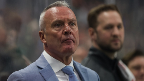 Former Minnesota Wild head coach Dean Evason looks on during play