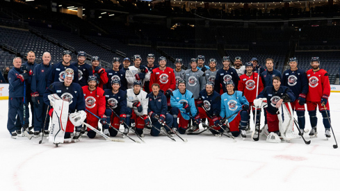 Guy Gaudrea in a team photo with the 2024-25 Columbus Blue Jackets