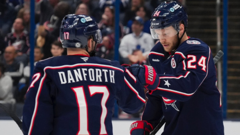 Columbus Blue Jackets right wing Mathieu Olivier (24) celebrates with teammates after scoring a goal against the Toronto Maple Leafs during the second period at Nationwide Arena.