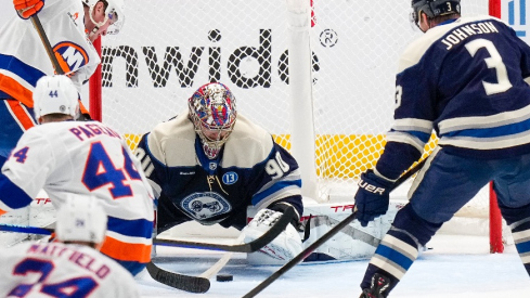 Columbus Blue Jackets goaltender Elvis Merzlikins (90) blocks a shot in the second period against the New York Islanders at Nationwide Arena.