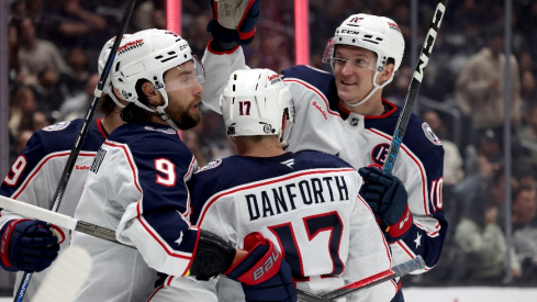 Columbus Blue Jackets defenseman Ivan Provorov (9) celebrates with right wing Justin Danforth (17) and left wing Dmitri Voronkov (10) after scoring during the third period against the Los Angeles Kings at Crypto.com Arena.