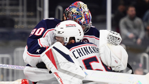 Columbus Blue Jackets goaltender Elvis Merzlikins (90) celebrates with defenseman David Jiricek (55) after defeating the Boston Bruins at TD Garden.