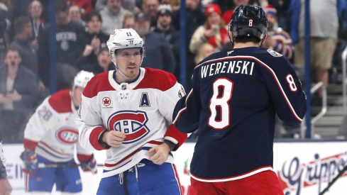 Columbus Blue Jackets defenseman Zach Werenski (8) and Montreal Canadiens right wing Brendan Gallagher (11) fight during the second period at Nationwide Arena.