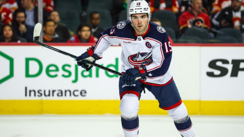 Columbus Blue Jackets defenseman Dante Fabbro (15) skates against the Calgary Flames during the second period at Scotiabank Saddledome.