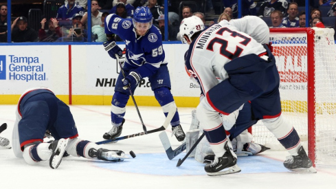 Tampa Bay Lightning center Jake Guentzel (59) shoots as Columbus Blue Jackets goaltender Jet Greaves (73) defends during the third period at Amalie Arena.