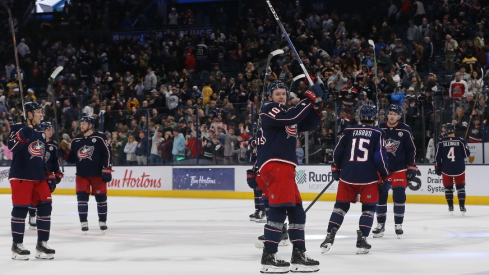 The Columbus Blue Jackets acknowledge the crowd after the game against the Boston Bruins at Nationwide Arena.