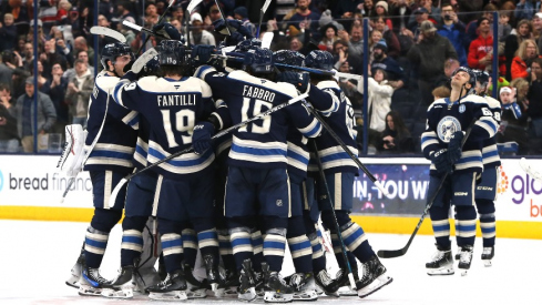 The Columbus Blue Jackets celebrate the win over the Philadelphia Flyers after the shootout at Nationwide Arena.