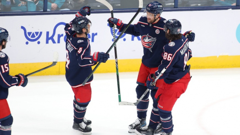 Columbus Blue Jackets left wing James van Riemsdyk (21) celebrates his goal with center Cole Sillinger (4) and right wing Kirill Marchenko (86) during the third period against the San Jose Sharks at Nationwide Arena.