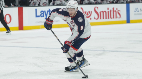 Columbus Blue Jackets defenseman Zach Werenski (8) controls the puck during the third period against the Utah Hockey Club at Delta Center.