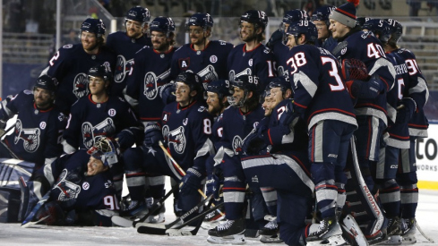 The Columbus Blue Jackets pose for a team photo after the game against the Detroit Red Wings at Ohio Stadium.