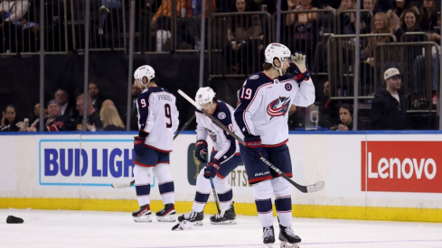 A hat lands on the ice as Columbus Blue Jackets center Adam Fantilli (19) celebrates his hat trick against the New York Rangers during the third period at Madison Square Garden.