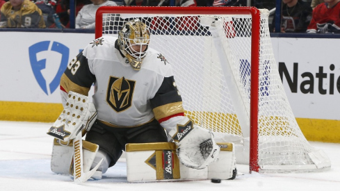 Vegas Golden Knights goalie Adin Hill (33) makes a pad save against the Columbus Blue Jackets during the third period at Nationwide Arena.