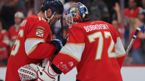 Florida Panthers center Aleksander Barkov (16) and goaltender Sergei Bobrovsky (72) celebrate after the game against the Tampa Bay Lightning at Amerant Bank Arena.