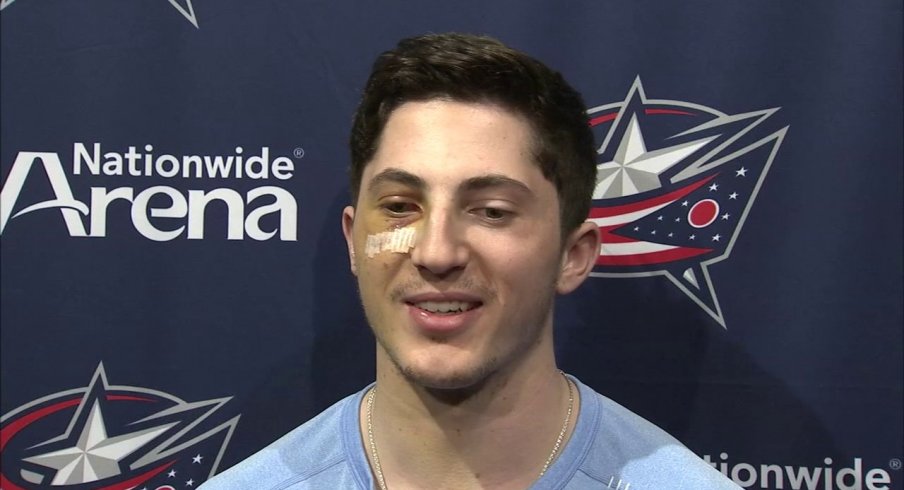 Zach Werenski Face : Young Blue Jackets Fan Rocks Puck-to-face Zach ...