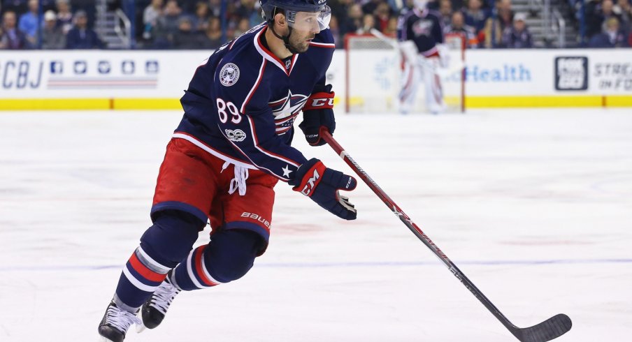 Sam Gagner skates the puck up the ice.