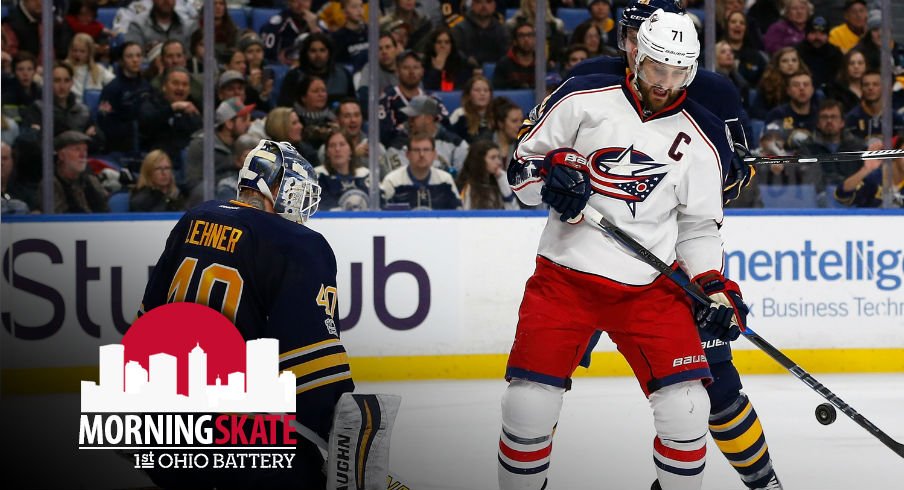 Nick Foligno sits net front hoping to score on Robin Lehner