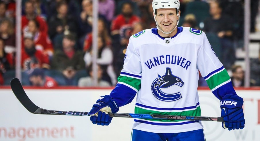 Derek Dorsett waits for the puck to drop during a game against the Calgary Flames