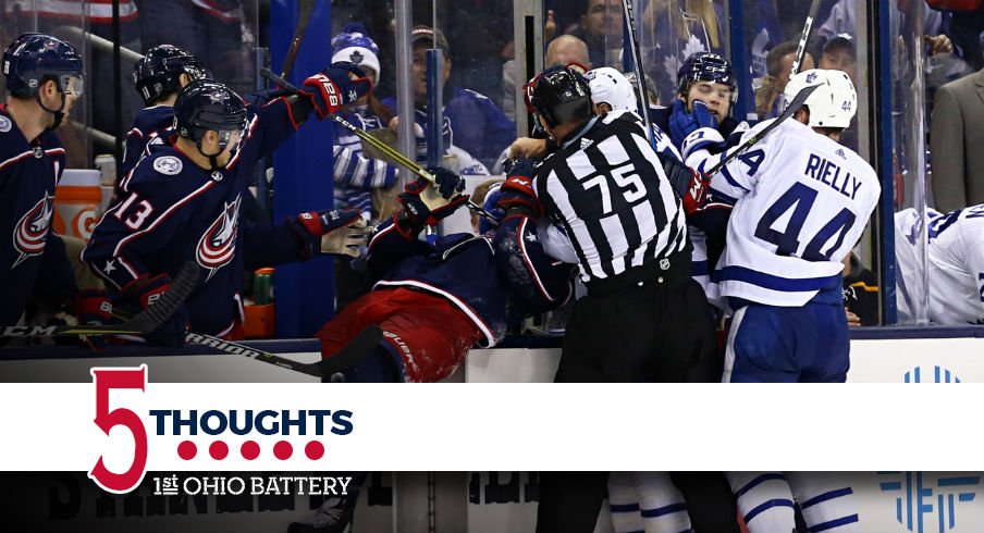 Matt Martin goes to grab Lukas Sedlak off of the bench during the run of play.