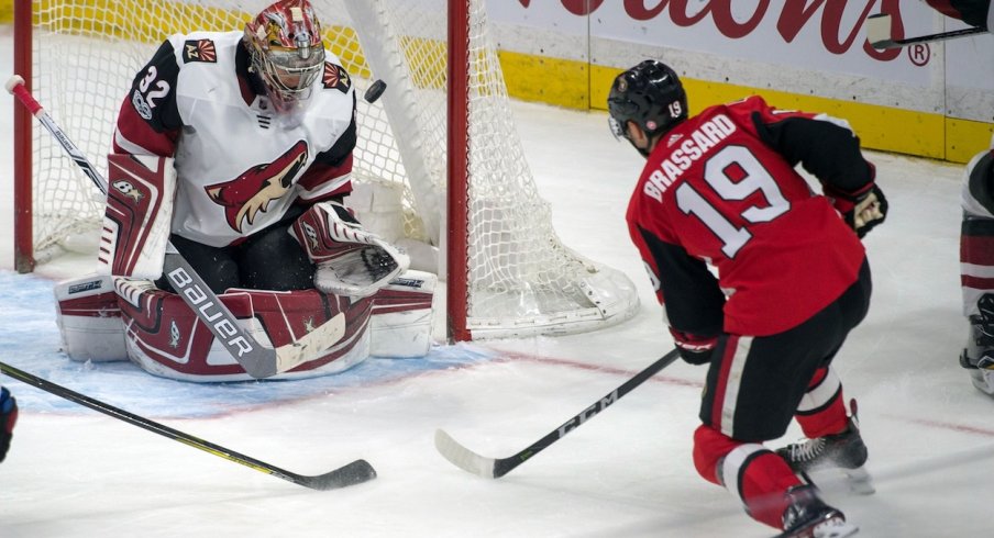 Senators Derick Brassard tries to put the puck past Coyotes Antti Raanta 