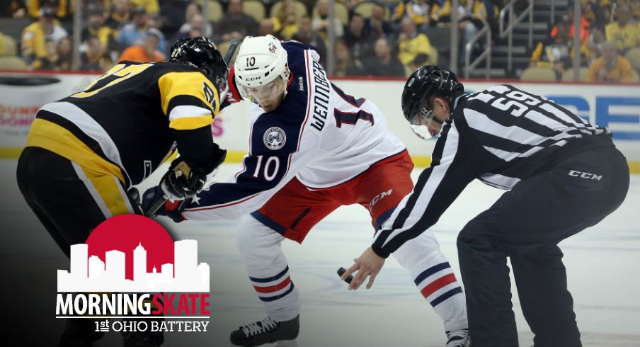 Alexander Wennberg fights for a faceoff against Sidney Crosby of the Pittsburgh Penguins