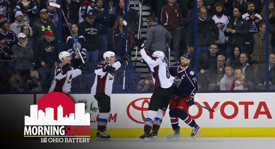 Erik Johnson and Blake Comeau score a goal in Nationwide Arena.