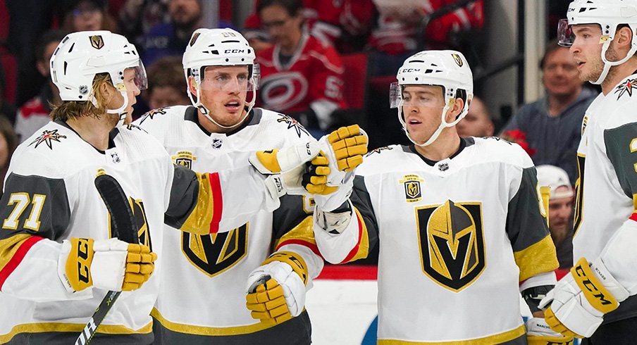 Former Blue Jackets William Karlsson and Jonathan Marchessault celebrate a goal against the Carolina Hurricanes. 