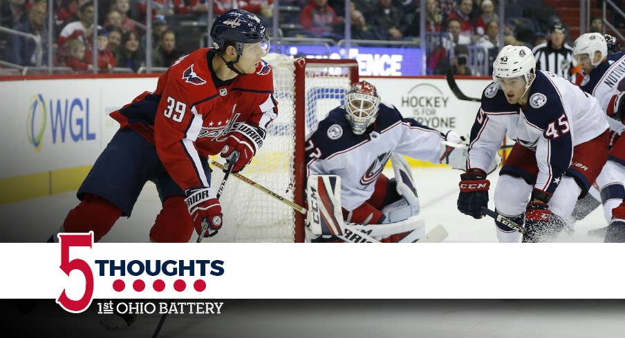 Blue Jackets forward Lukas Sedlak defends the net in front of Sergei Bobrovsky.