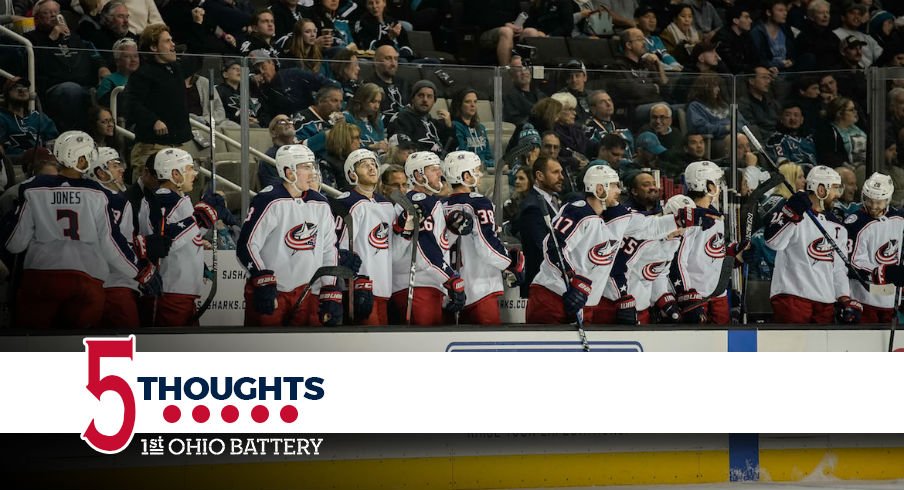 Blue Jackets celebrate a second period goal against the Sharks